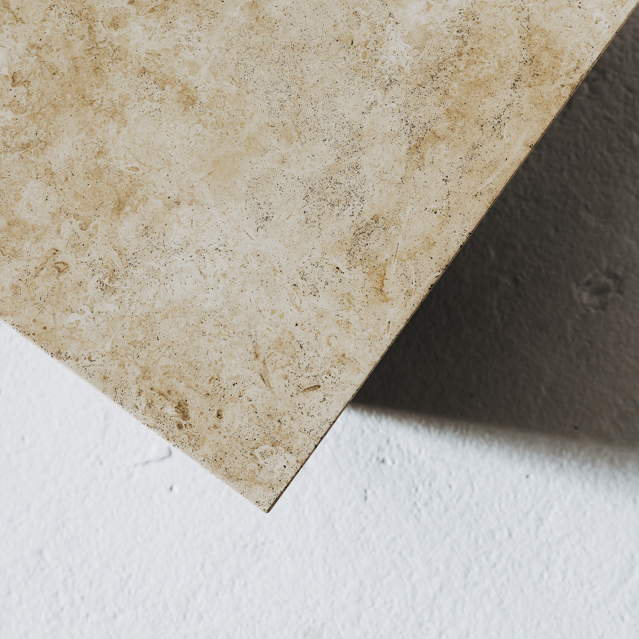 Materiem objects travertine side table web 1 2